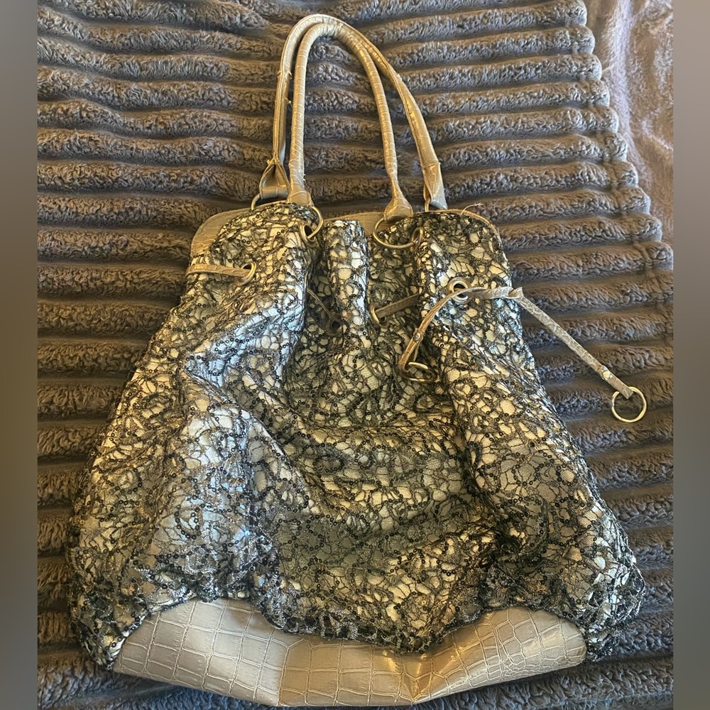 Buckle brand, shoulder bag